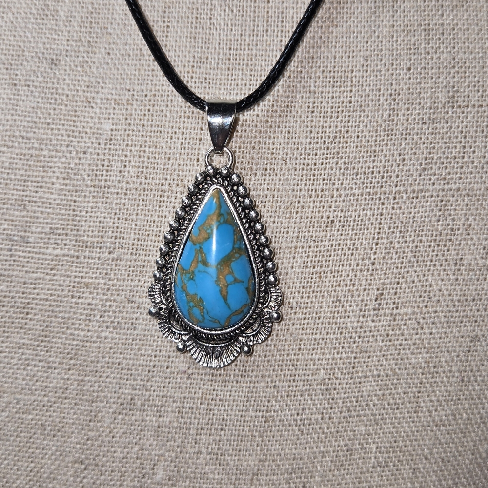 Elegant Silver and Turquoise Pendant Necklace